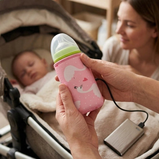 Chauffe biberon nomade motif cygne relié à une batterie externe