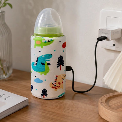 Chauffe biberon nomade motif dinosaure branché sur prise murale