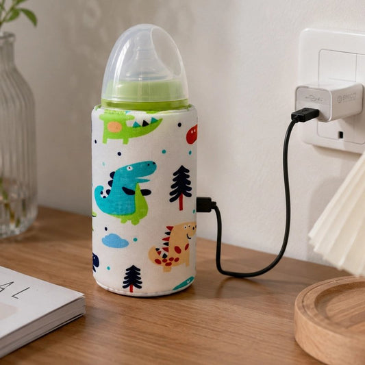 Chauffe biberon nomade motif dinosaure branché sur prise murale